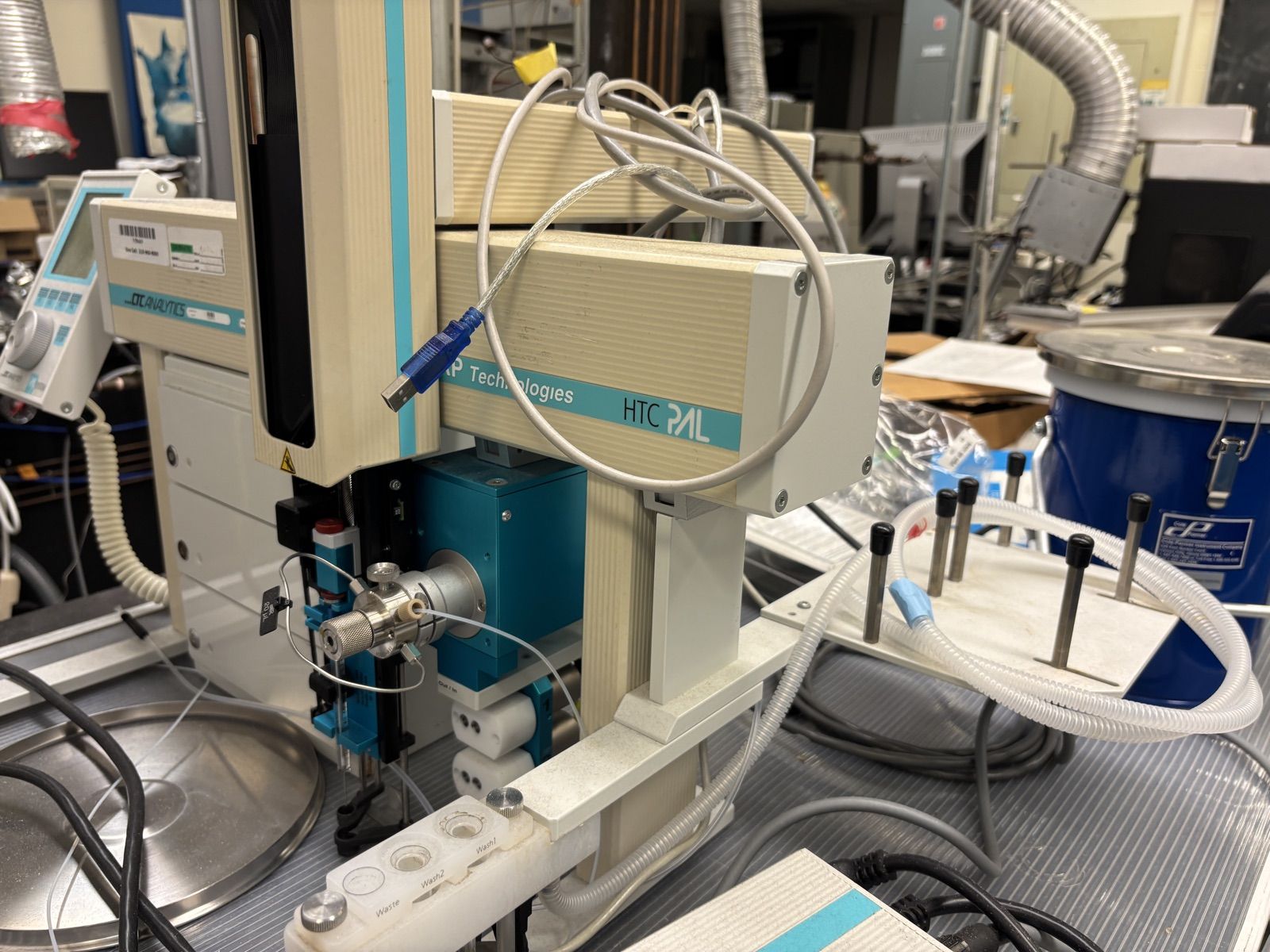 CTC HTC PAL autosampler with an LC injection valve, wash station and handheld controller.