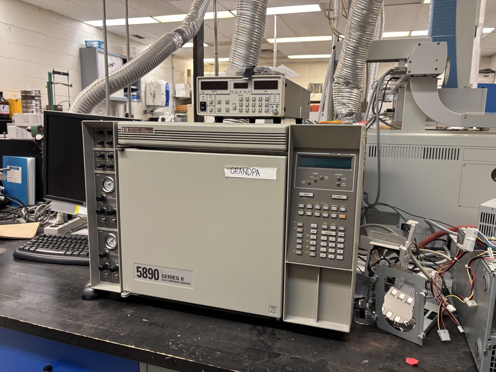 Hewlett-Packard 5890 Series II gas chromatograph with two inlet flow panels.